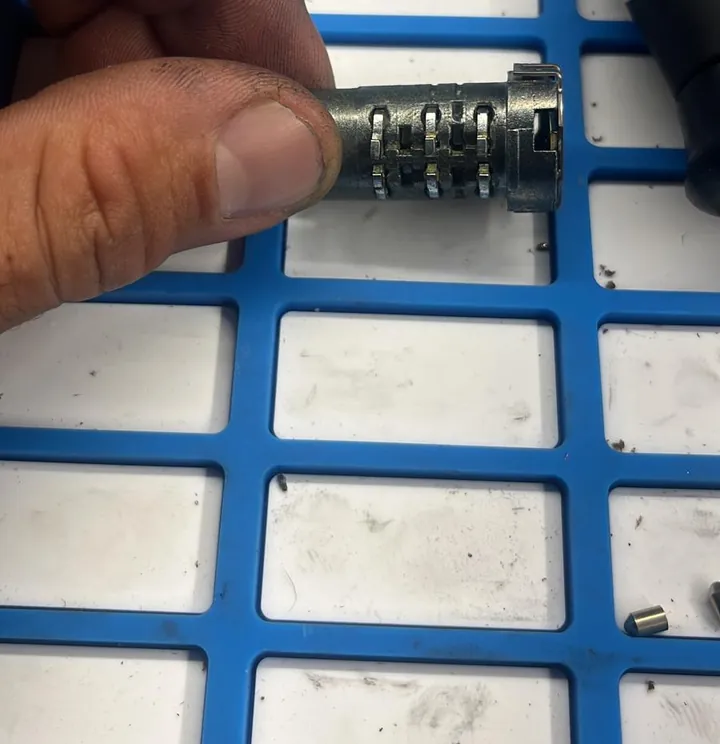 Lock cylinder with pins laid out for rekeying