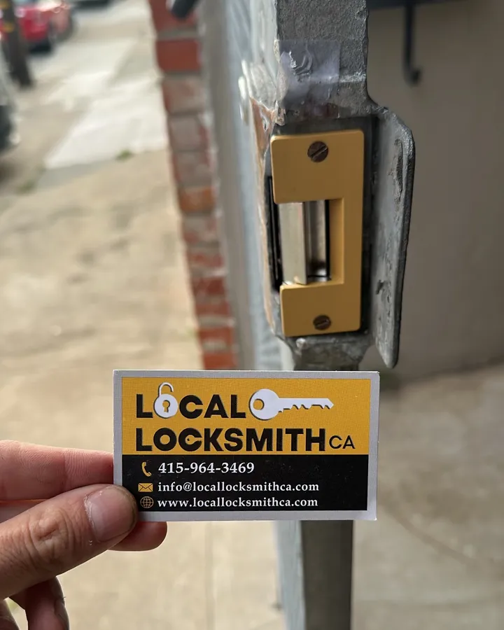 Electric strike installed in the frame of a metal gate