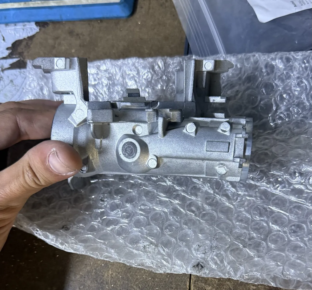 Ignition lock housing removed from a car for repair