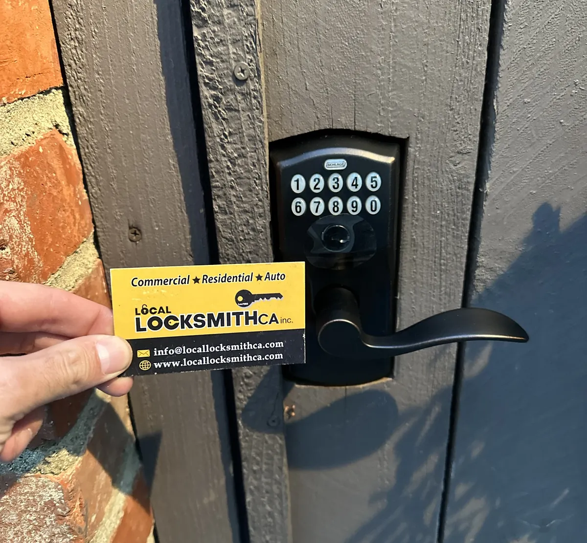 Keypad lever lock installed on a wooden gate