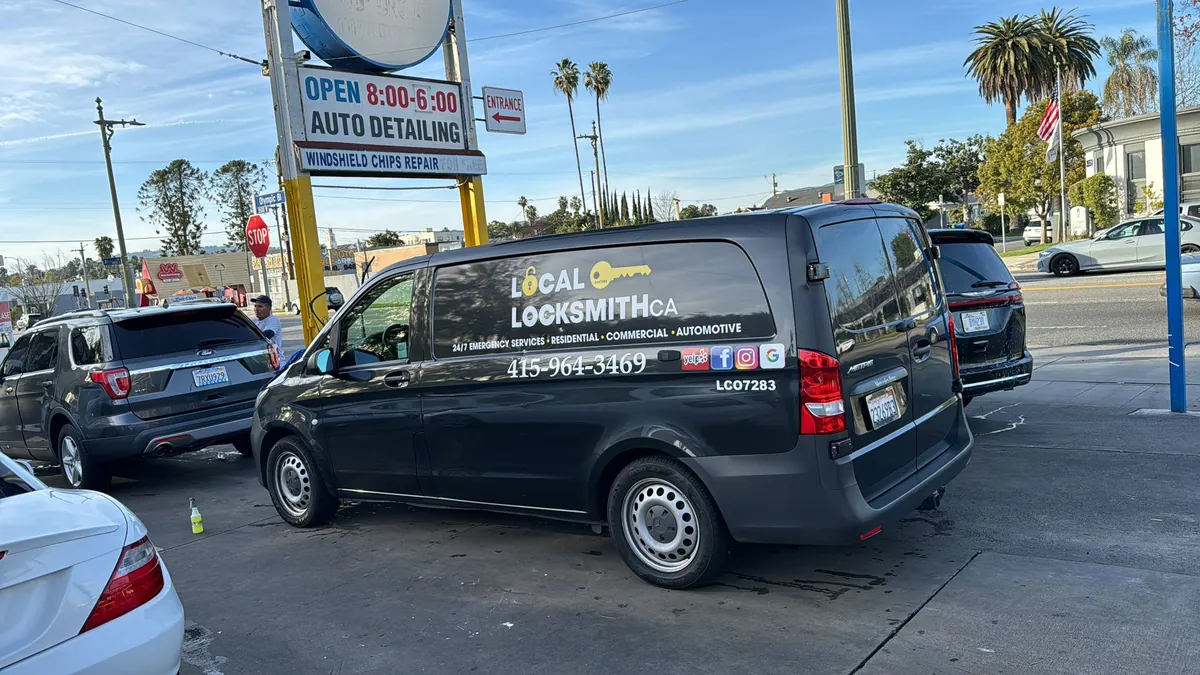 Local Locksmith CA van parked in a lot on a sunny day